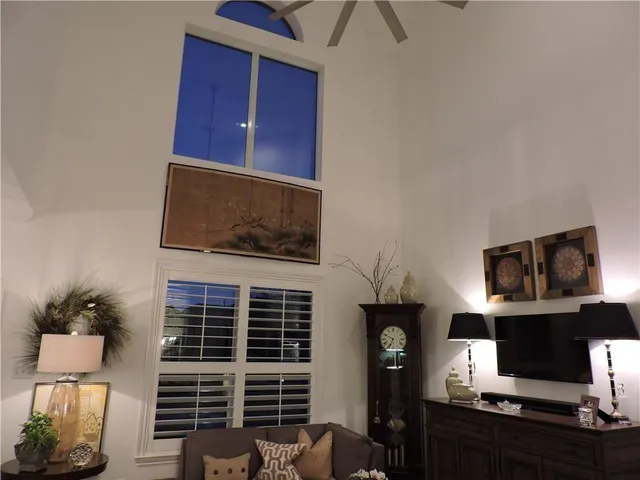 a view of workspace with wooden floor outdoor seating and kitchen view