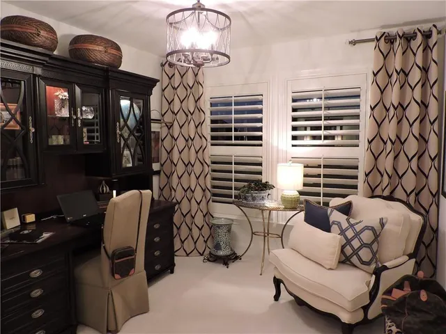 a kitchen with a stove and a refrigerator