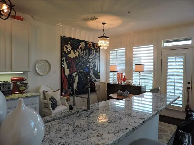 a view of a living room and dining room