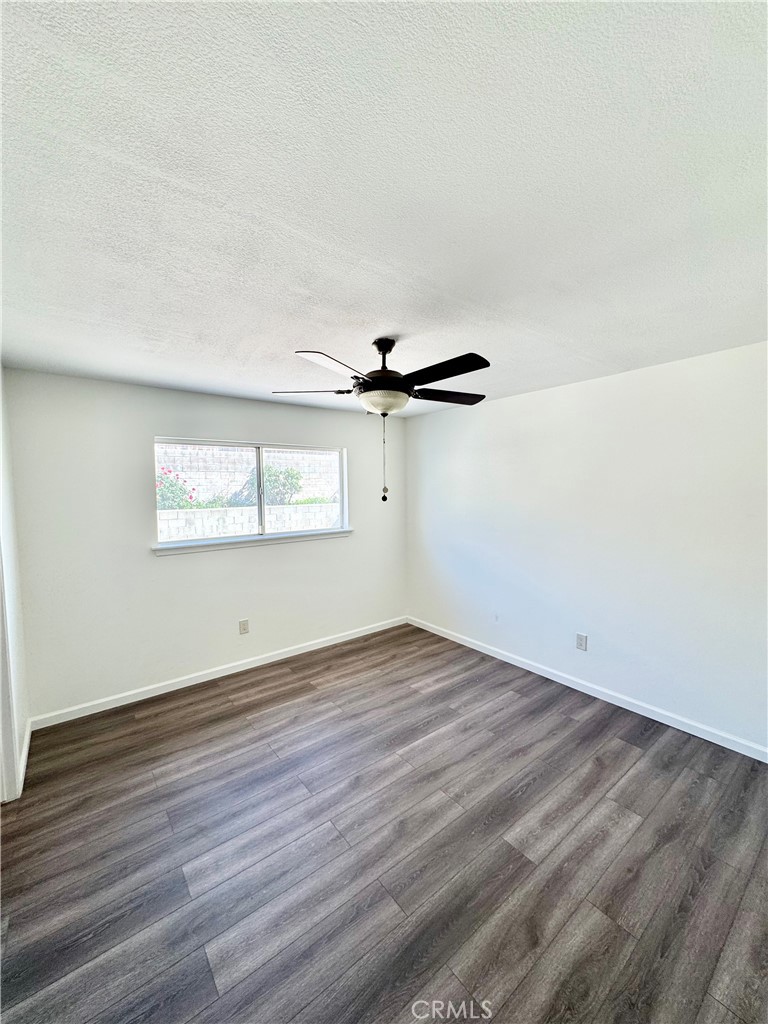 9364 Langston Street Rancho Cucamonga, CA 91730 - Photo 6 of 17 wooden floor in an empty room