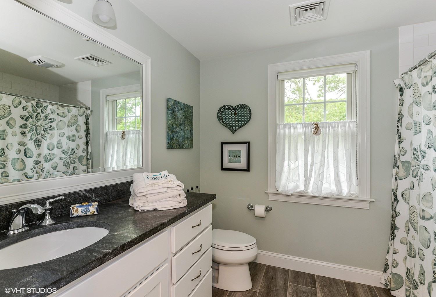 18 Darby Way Osterville, MA 02655 - Photo 12 of 15 a bathroom with a granite countertop sink mirror and window