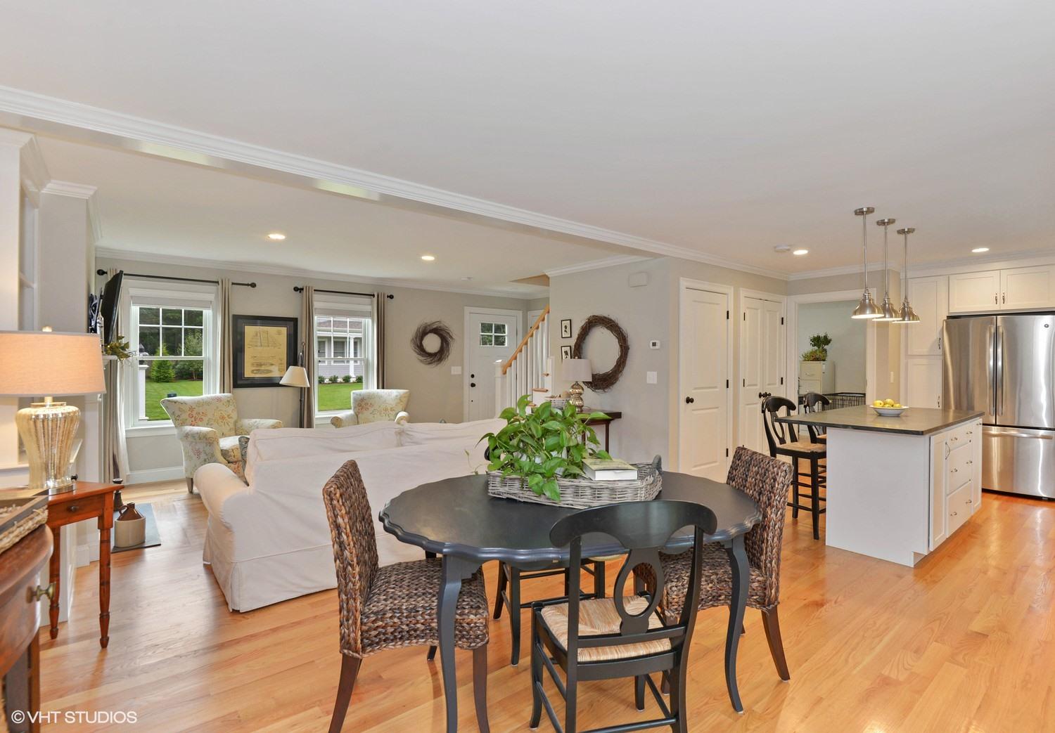 18 Darby Way Osterville, MA 02655 - Photo 6 of 15 a view of a dining room with furniture and wooden floor