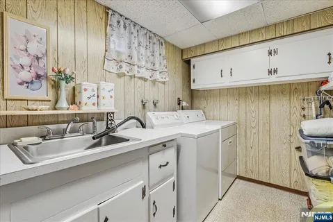 a utility room with cabinets