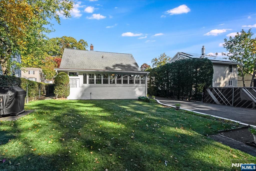 29 Lynwood Road Verona, NJ 07044 - Photo 24 of 39 a view of a house with a yard and tree s