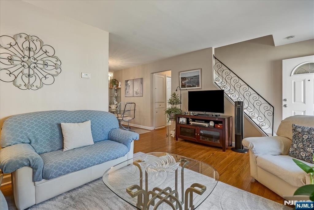 29 Lynwood Road Verona, NJ 07044 - Photo 6 of 39 a living room with furniture and a flat screen tv