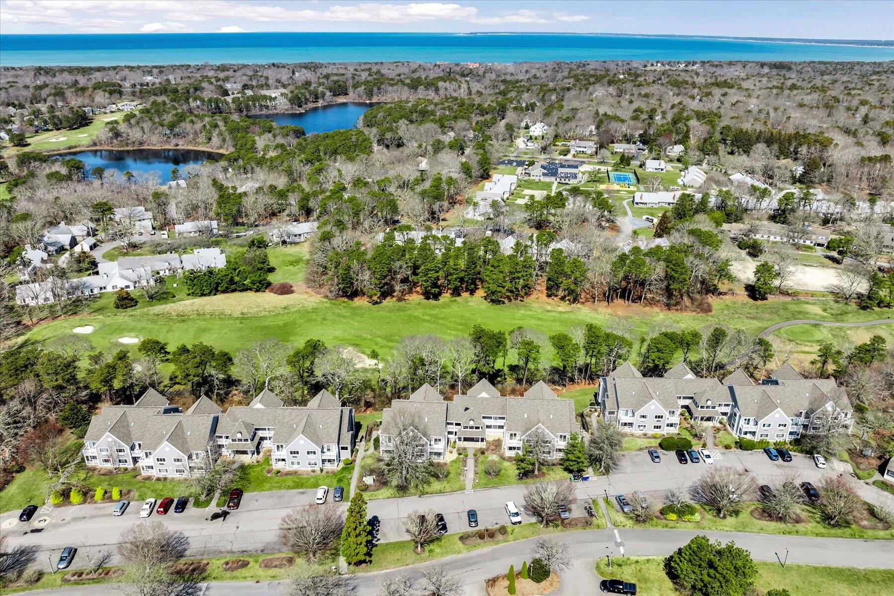 62 Fletcher Lane, Unit G Brewster, MA 02631 - Photo 18 of 30 an aerial view of a city with lots of residential buildings