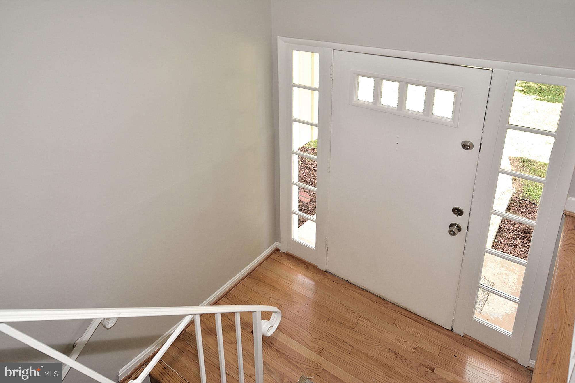 8115 Blairton Road Springfield, VA 22152 - Photo 3 of 29 Split Foyer Entrance with Oak Hardwood
