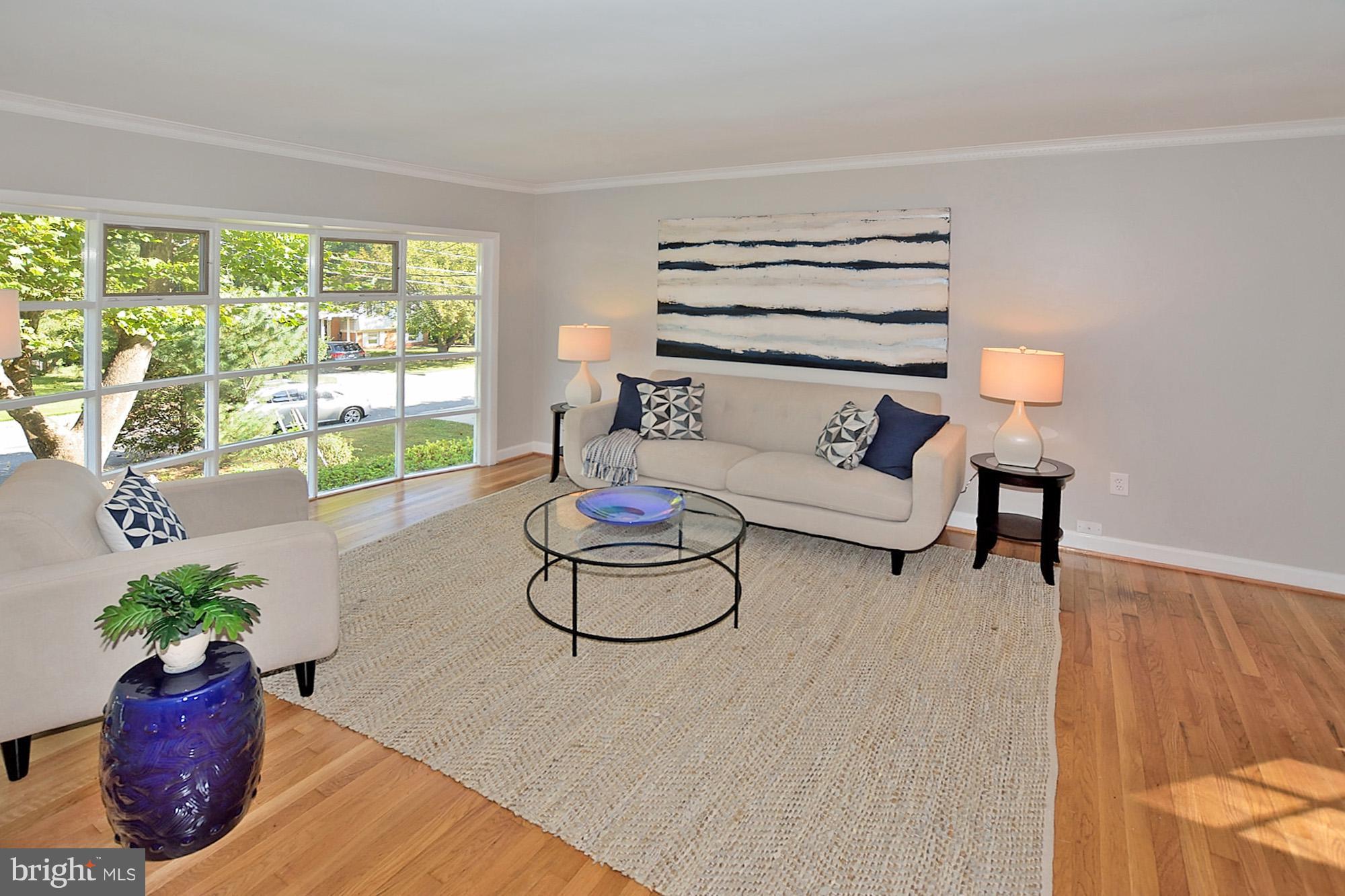 8115 Blairton Road Springfield, VA 22152 - Photo 4 of 29 Sunlit Living room with Window Wall
