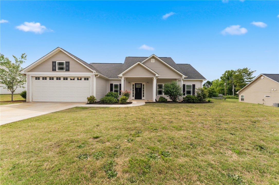 1411 Dunn Road Anderson, SC 29625 - Photo 1 of 30 This charming home features a classic exterior and a spacious front yard, offering a welcoming ambiance.