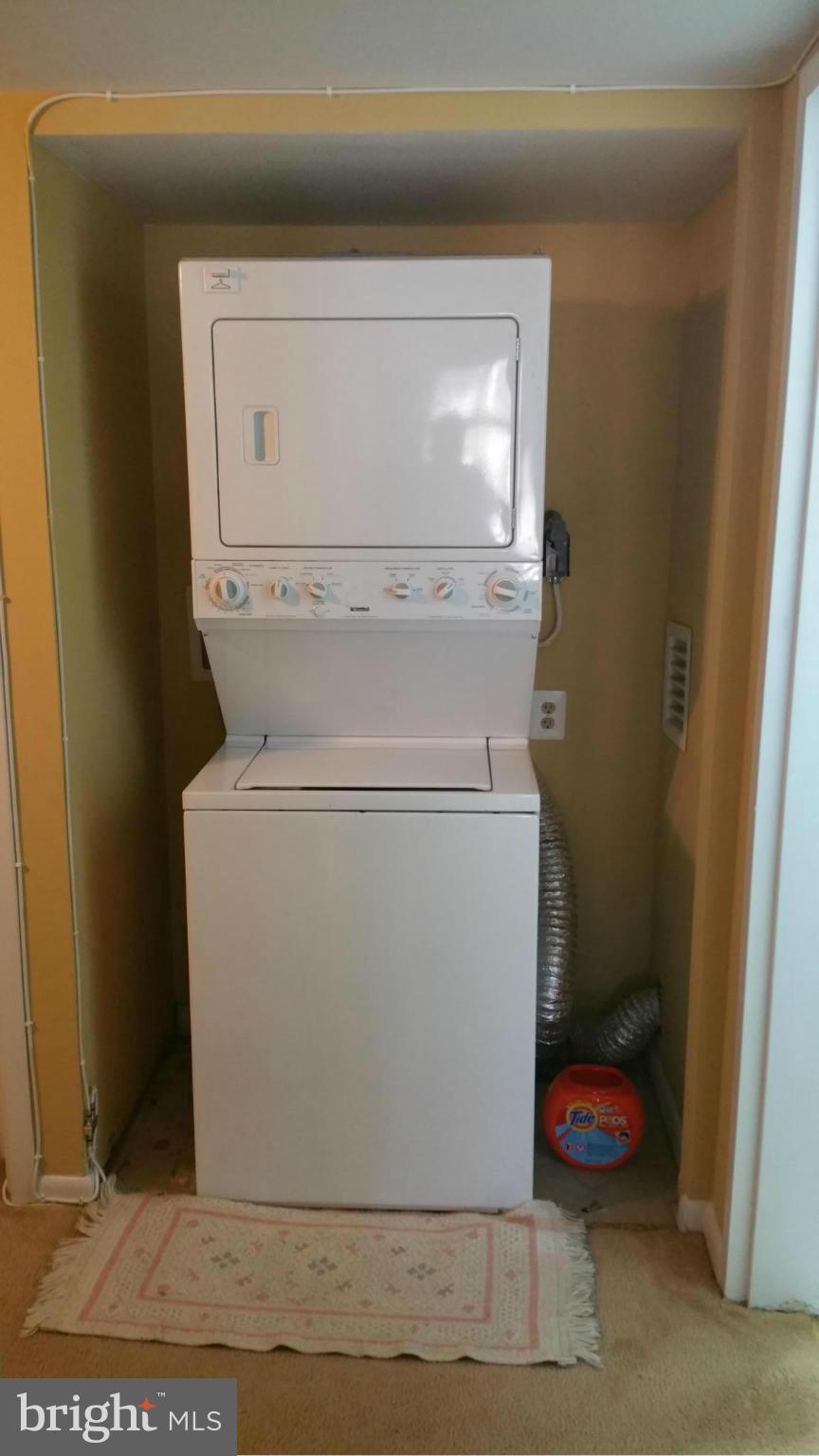 2234 Castle Rock Square, Unit 11C Reston, VA 20191 - Photo 13 of 30 a close up view of washer and dryer