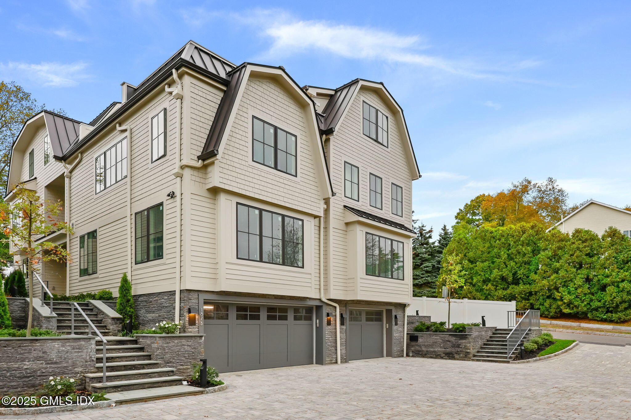 187 Field Point Road, Unit A Greenwich, CT 06830 - Photo 28 of 32 a front view of a building with street view