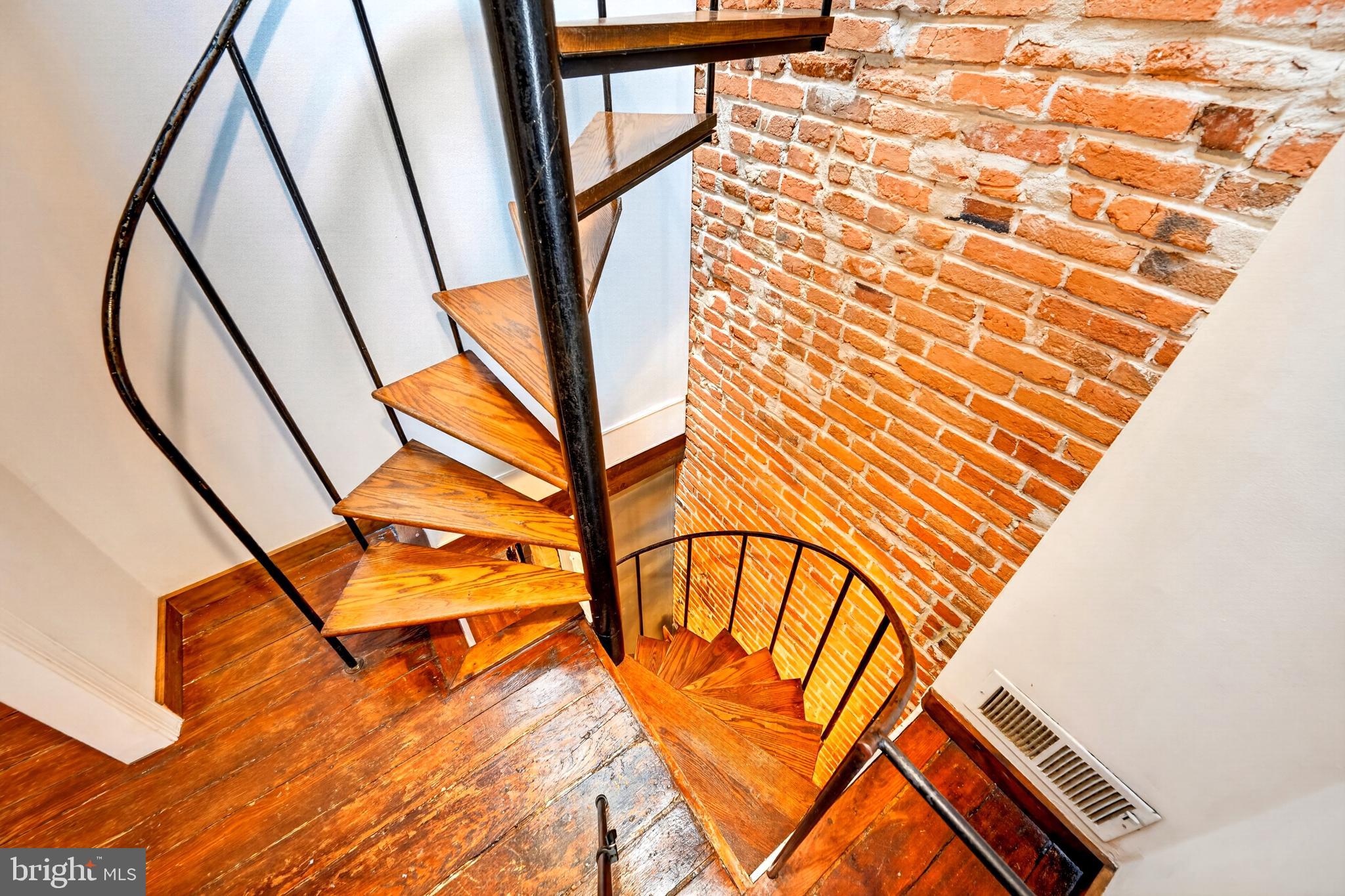11 East Wheeling Street Baltimore, MD 21230 - Photo 29 of 35 So many memories could be hung on the brick wall