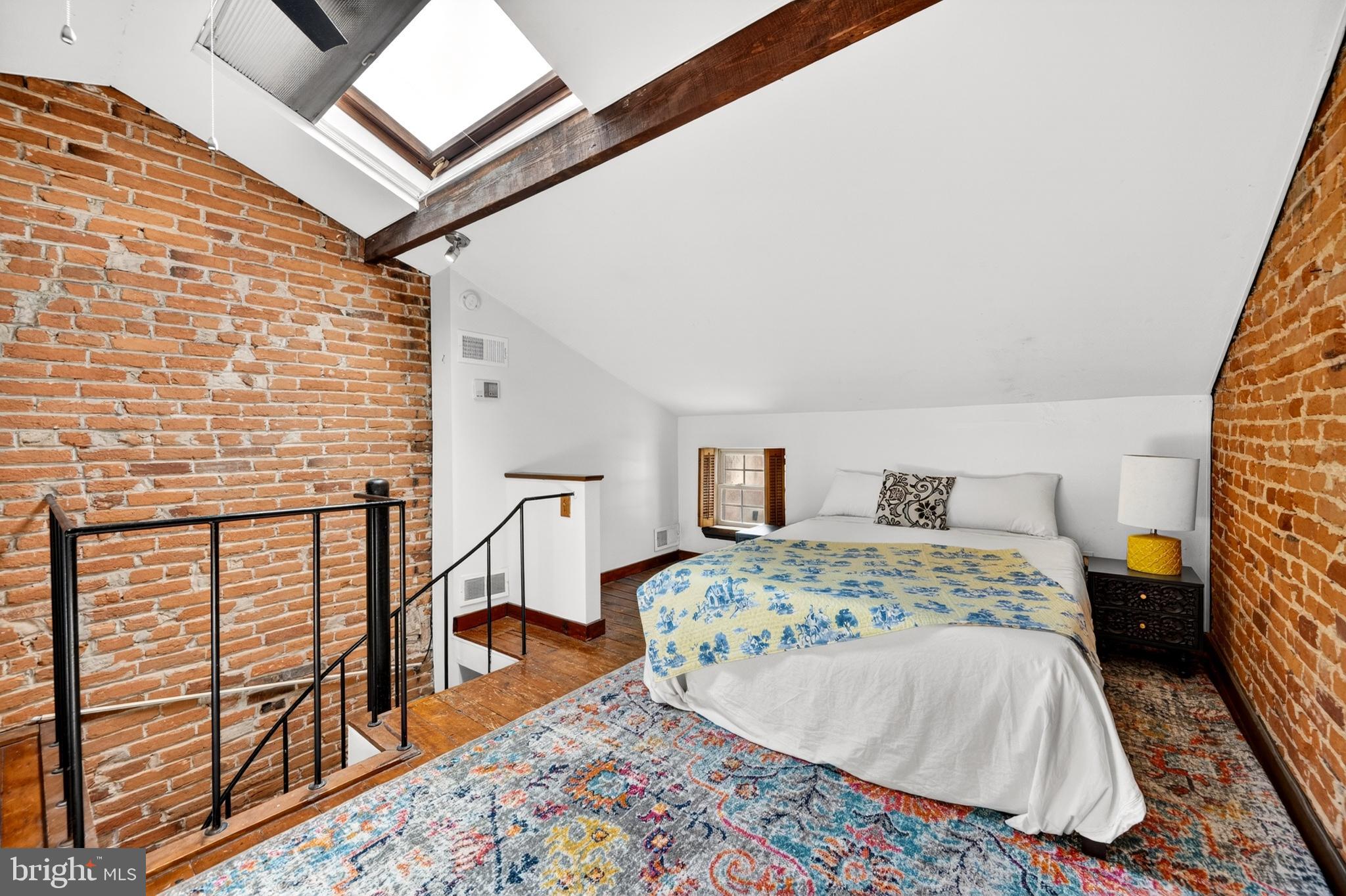 11 East Wheeling Street Baltimore, MD 21230 - Photo 30 of 35 2nd Loft style bedroom with skylight and hardwood