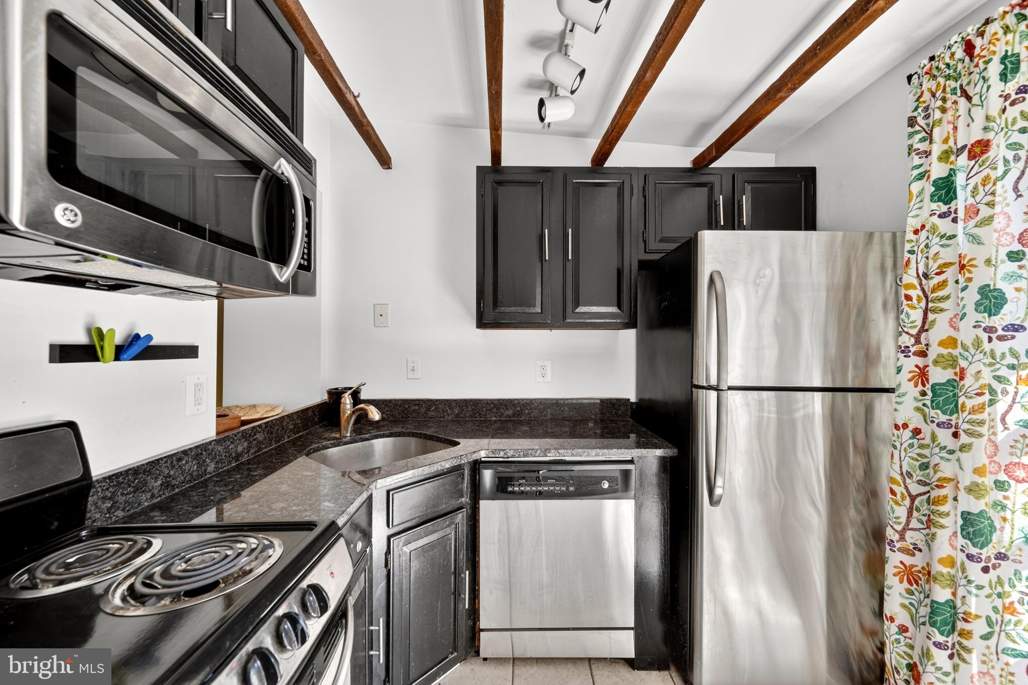11 East Wheeling Street Baltimore, MD 21230 - Photo 8 of 35 Rear kitchen extension and the exposed beams!