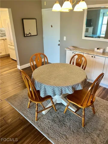 a living room with a couch and large window