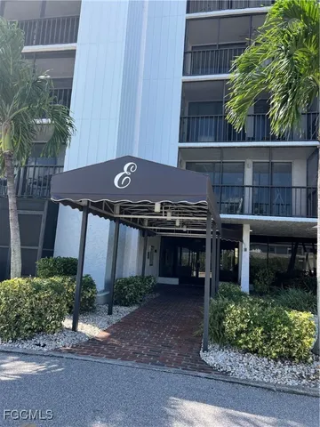 front view of a house with a garden