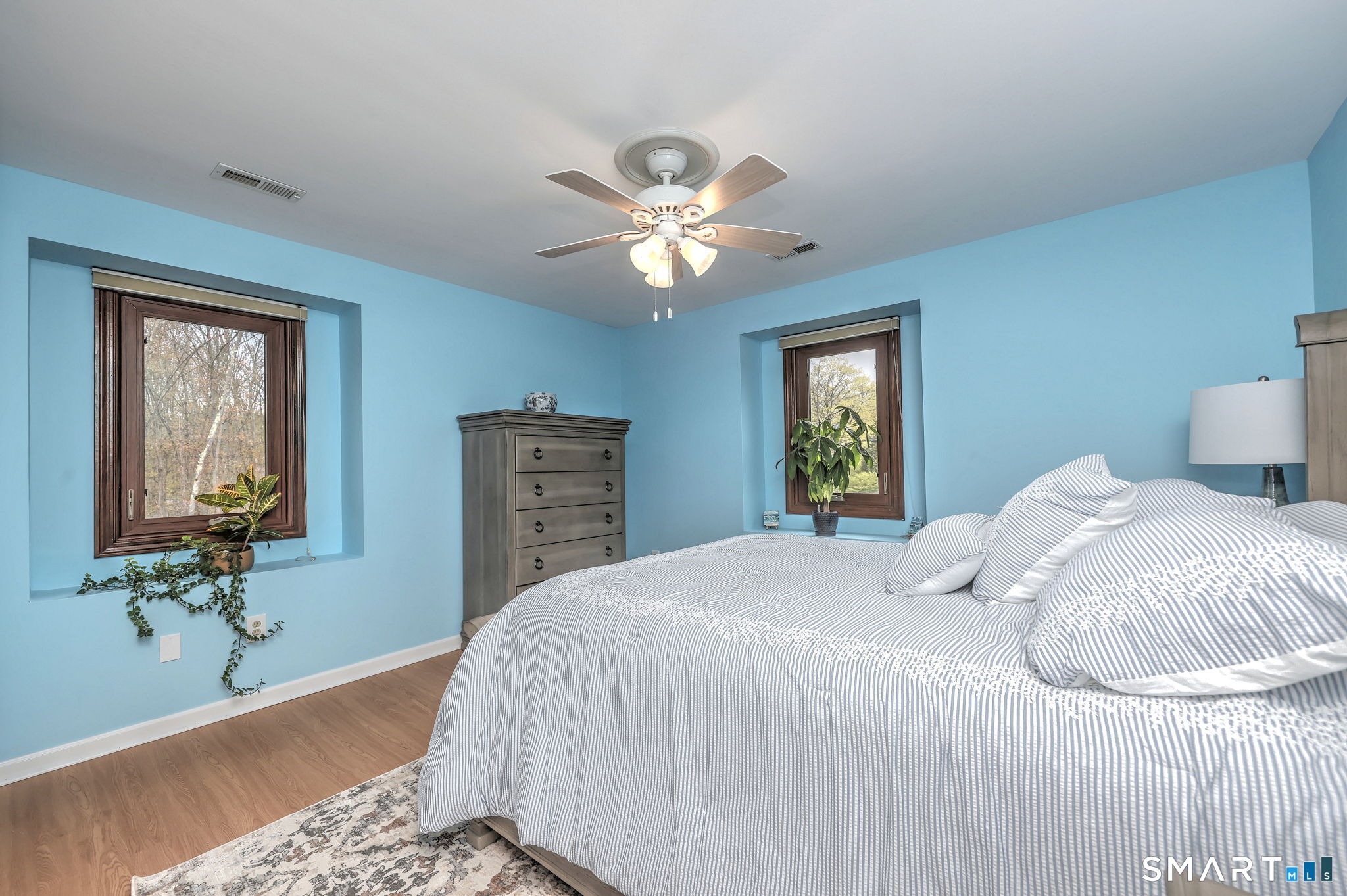 2262 Ridge Road North Haven, CT 06473 - Photo 11 of 40 a bedroom with a bed and a chandelier