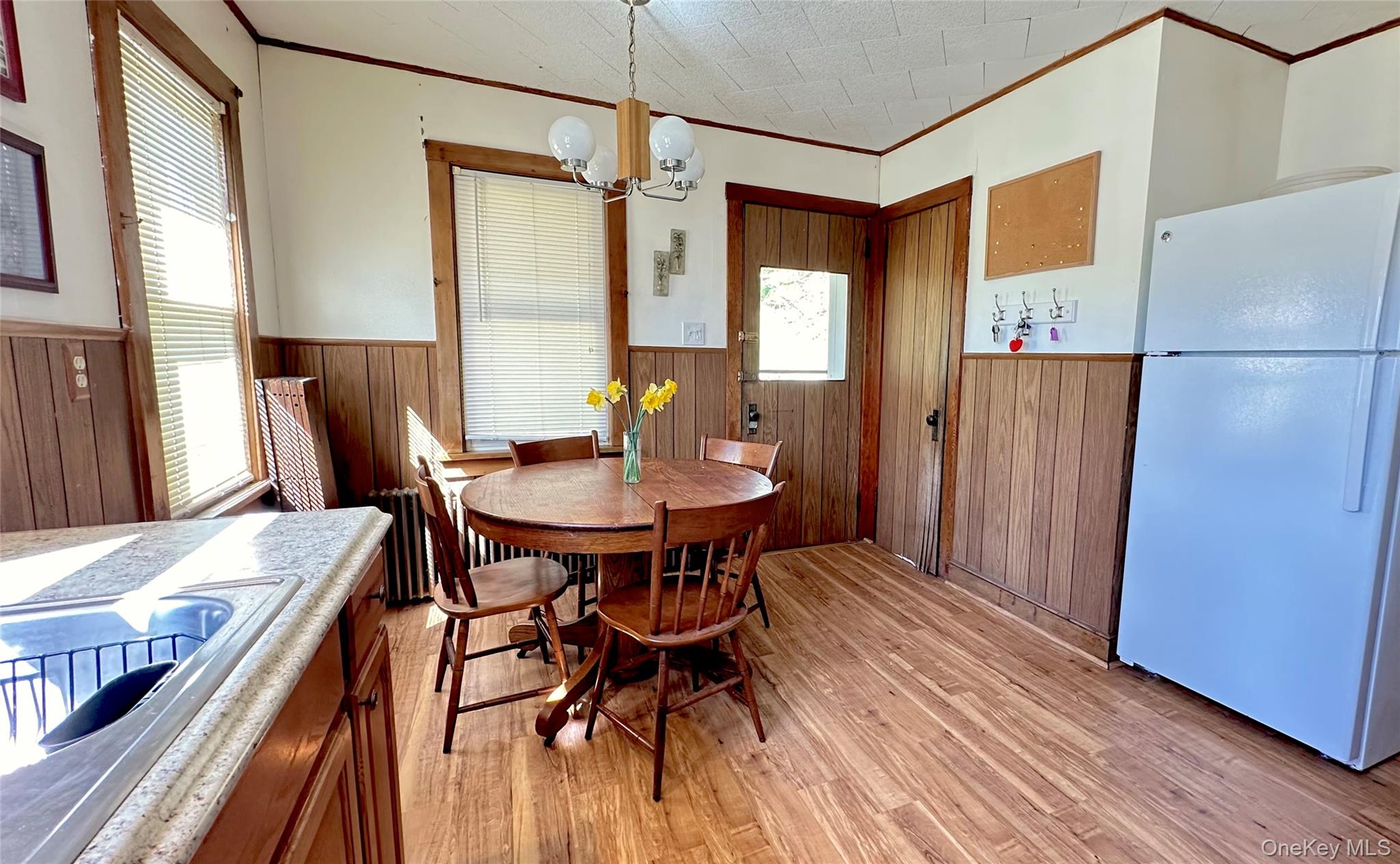 10 Upper Ferndale Road Liberty, NY 12754 - Photo 13 of 30 a view of a dining room with furniture window and wooden floor