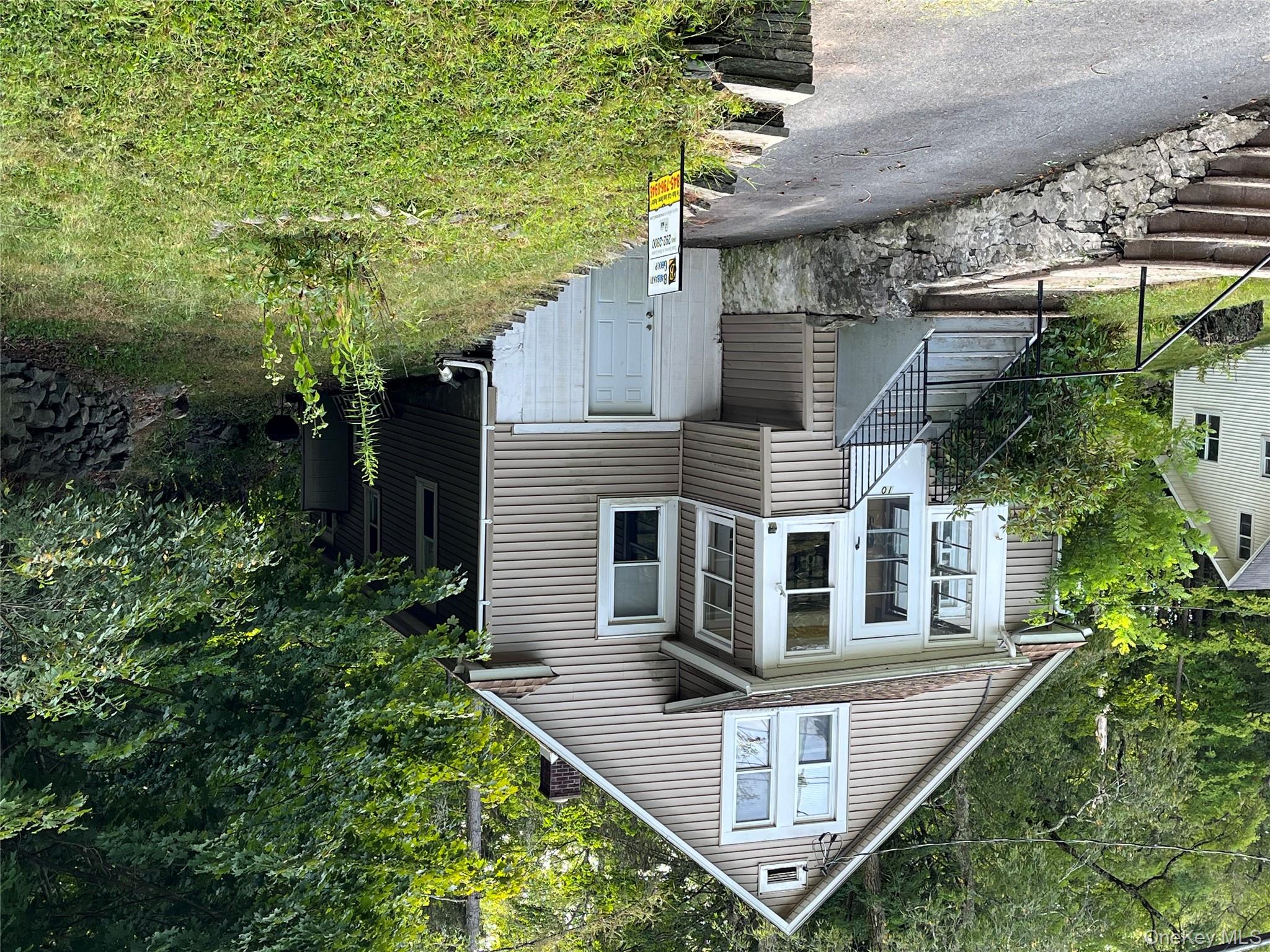 10 Upper Ferndale Road Liberty, NY 12754 - Photo 2 of 30 a front view of a house with garden