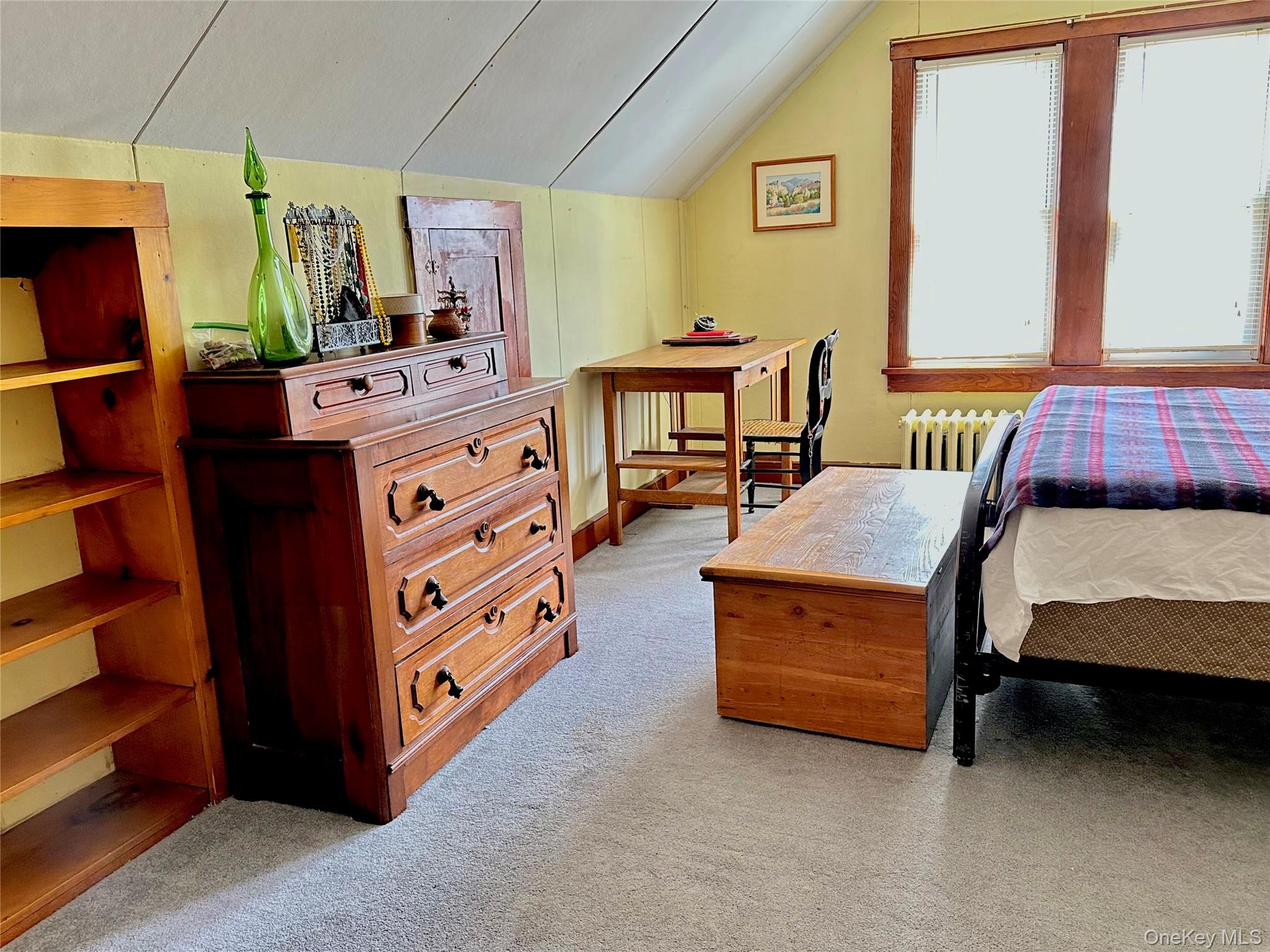 10 Upper Ferndale Road Liberty, NY 12754 - Photo 23 of 30 a living room with furniture and a dresser