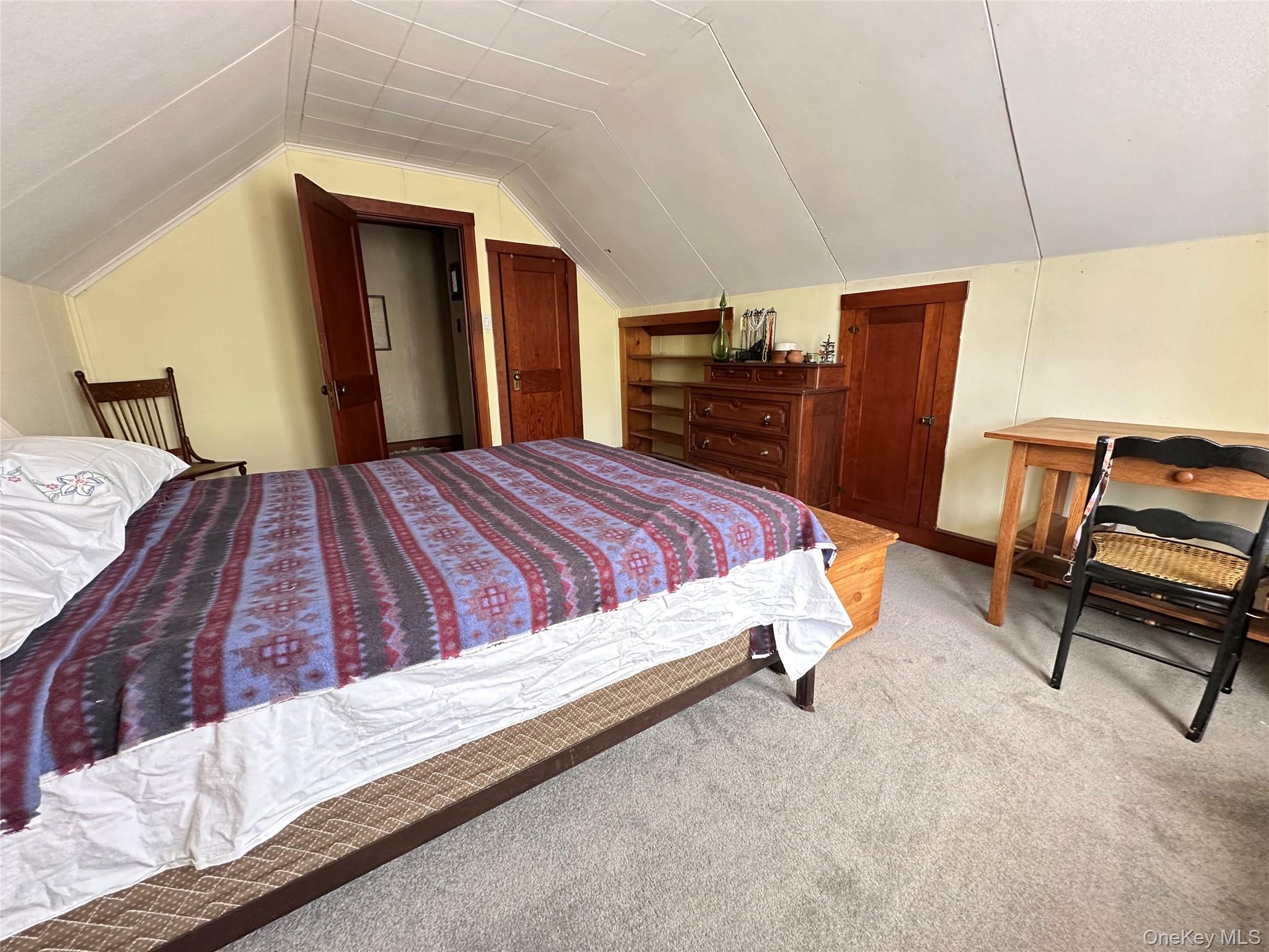 10 Upper Ferndale Road Liberty, NY 12754 - Photo 24 of 30 a bed sitting in a bedroom next to a window