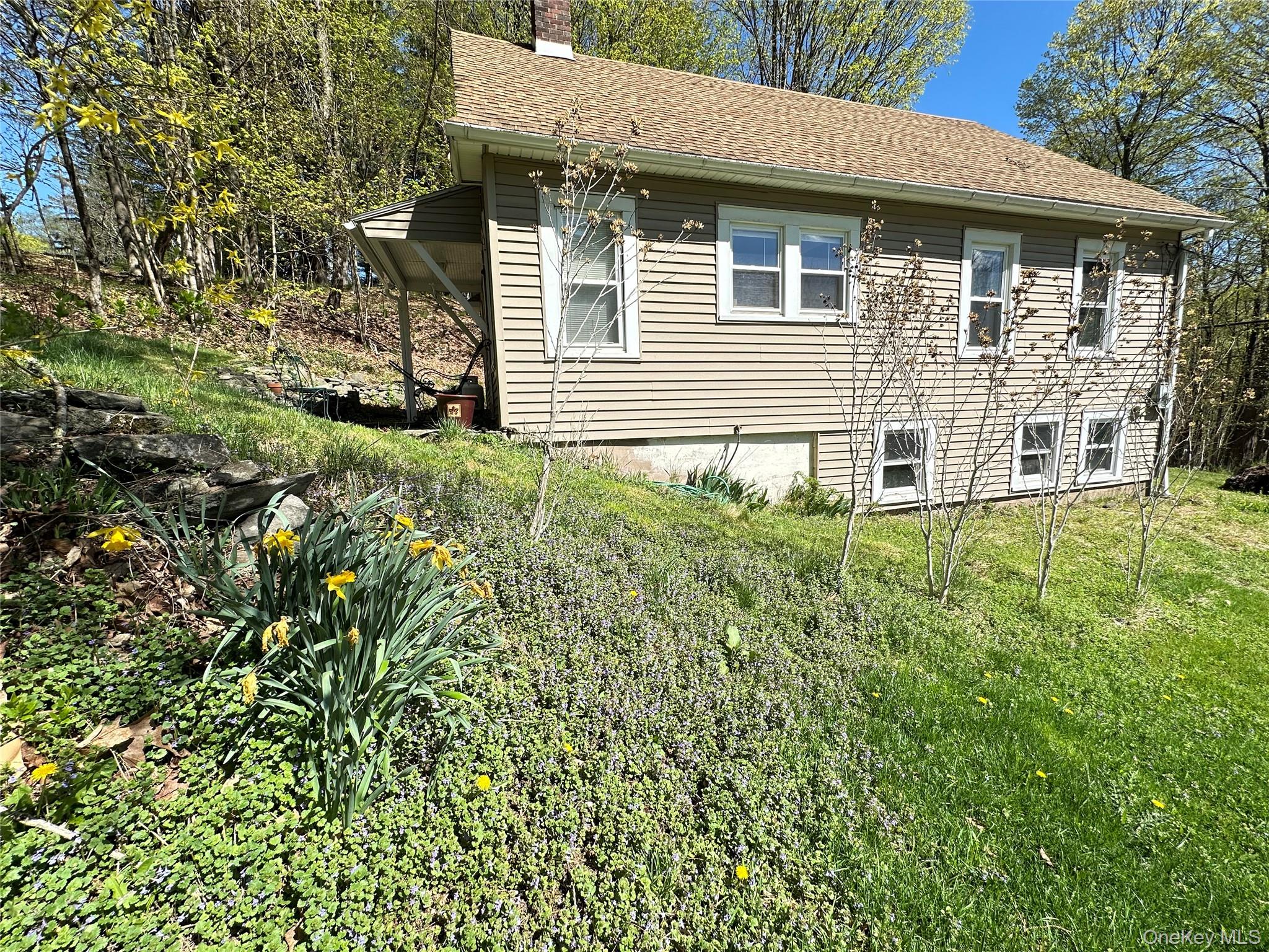 10 Upper Ferndale Road Liberty, NY 12754 - Photo 27 of 30 a front view of a house with a yard