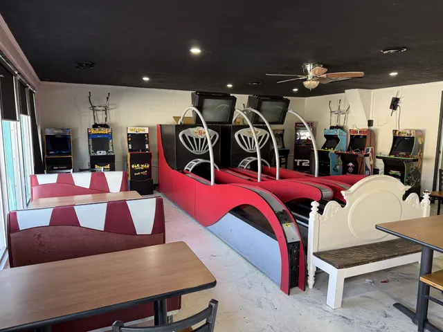 a kitchen with a sink and lots of appliances