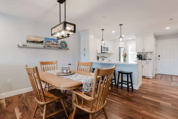 a bedroom with a bed and a television