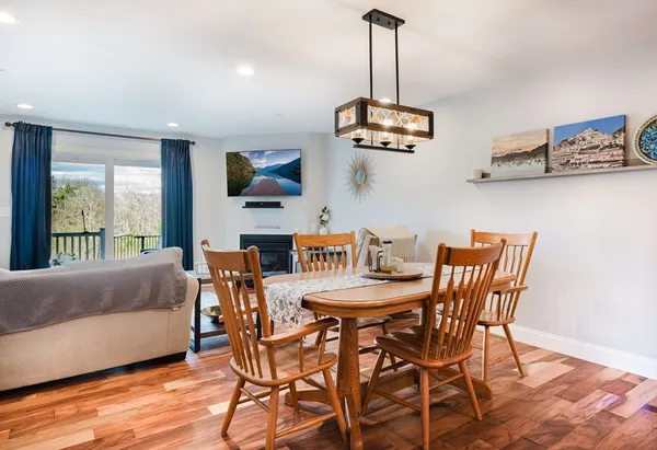 a bedroom with a bed and a night stand