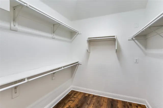 a view of an empty walk in closet