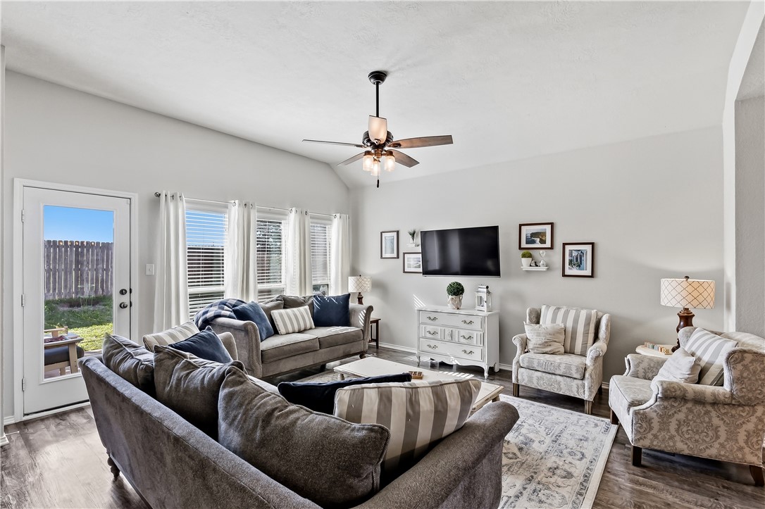 2721 Porter's Way Bryan, TX 77803 - Photo 5 of 17 So much natural light in the great living room with door to the back yard