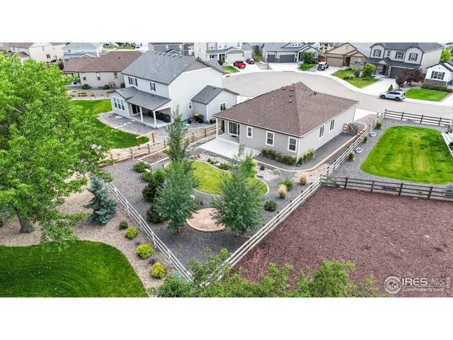 a view of a swimming pool and a yard