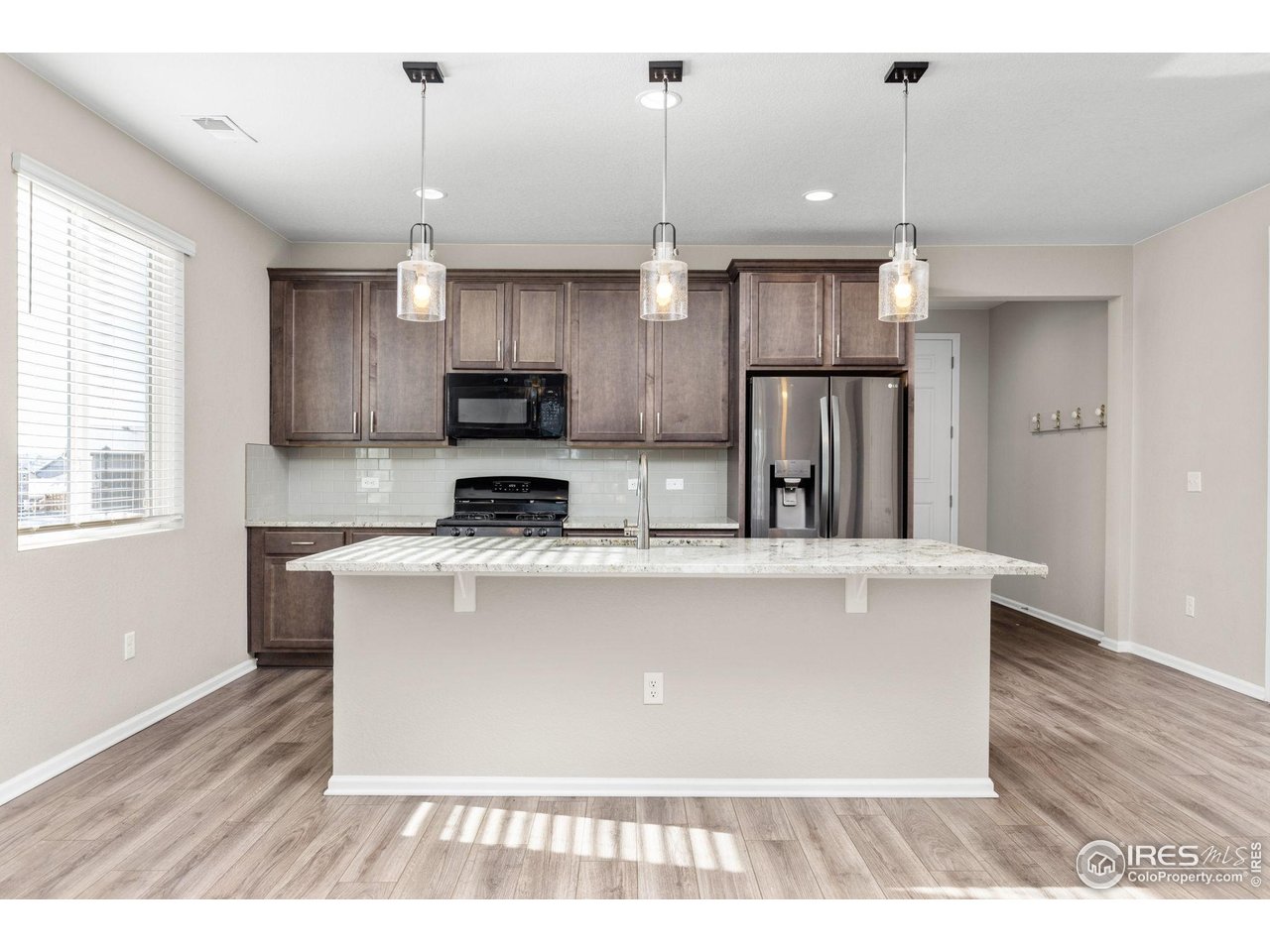 982 Blue Bell Road Berthoud, CO 80513 - Photo 4 of 32 Large center island.