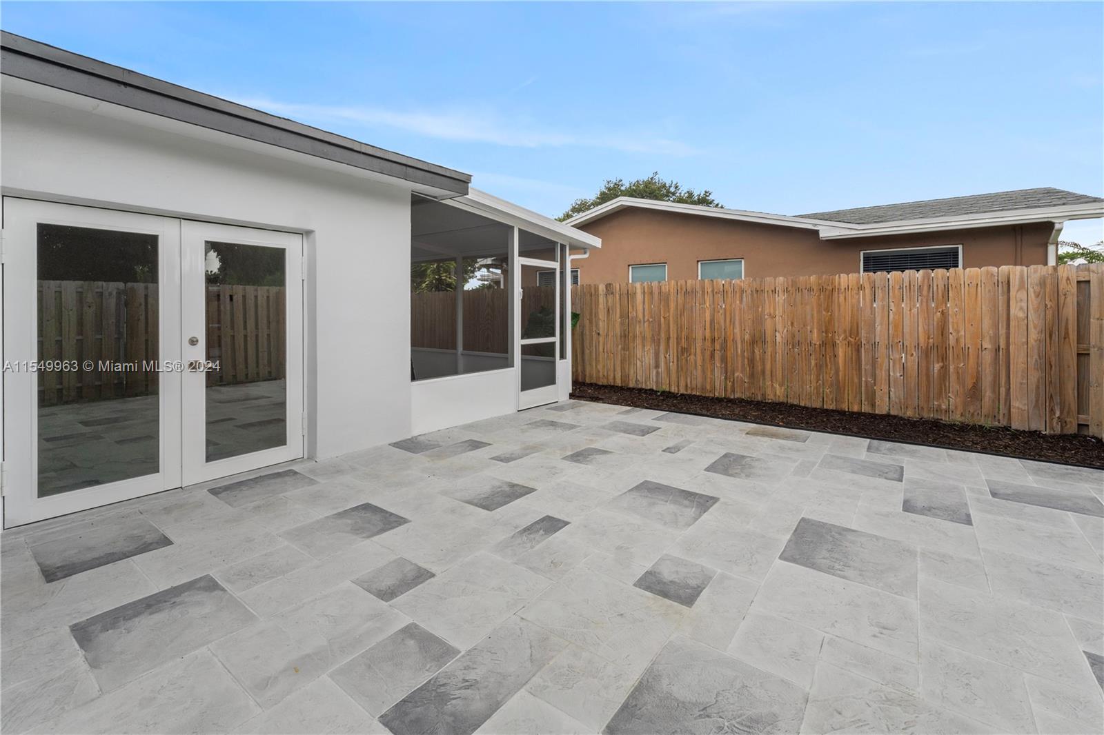 3600 West Park Road Hollywood, FL 33021 - Photo 24 of 38 a view of a house with a wooden fence