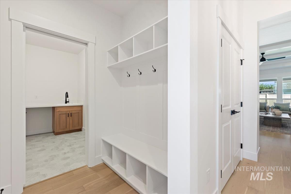 2126 East Blakehurst Street Kuna, ID 83634 - Photo 20 of 21 Mudroom featuring light wood-style flooring and baseboards