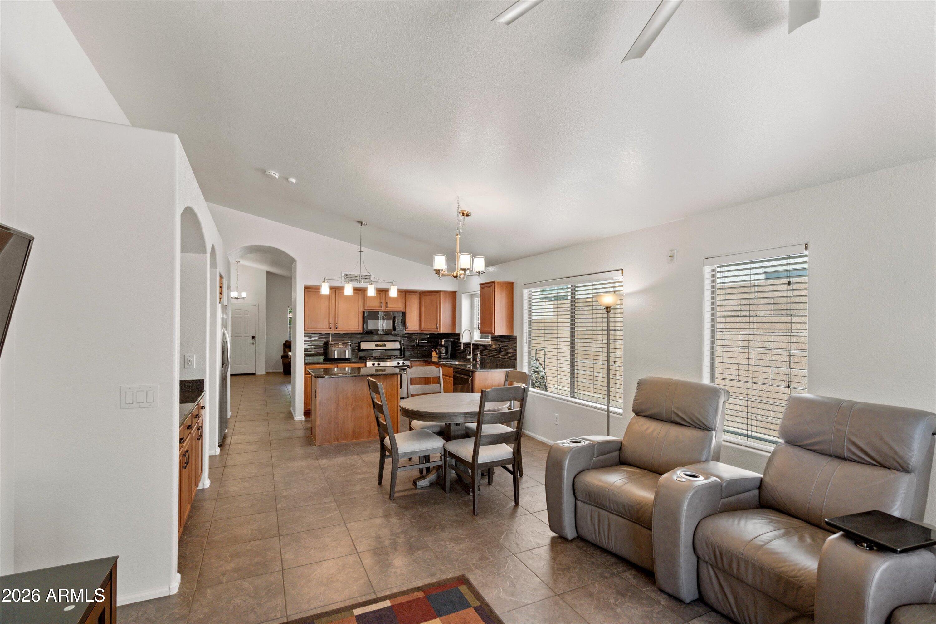 28619 North Nobel Road Phoenix, AZ 85085 - Photo 8 of 36 10-Family Room to Kitchen