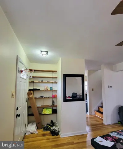 a room with furniture and gym equipment