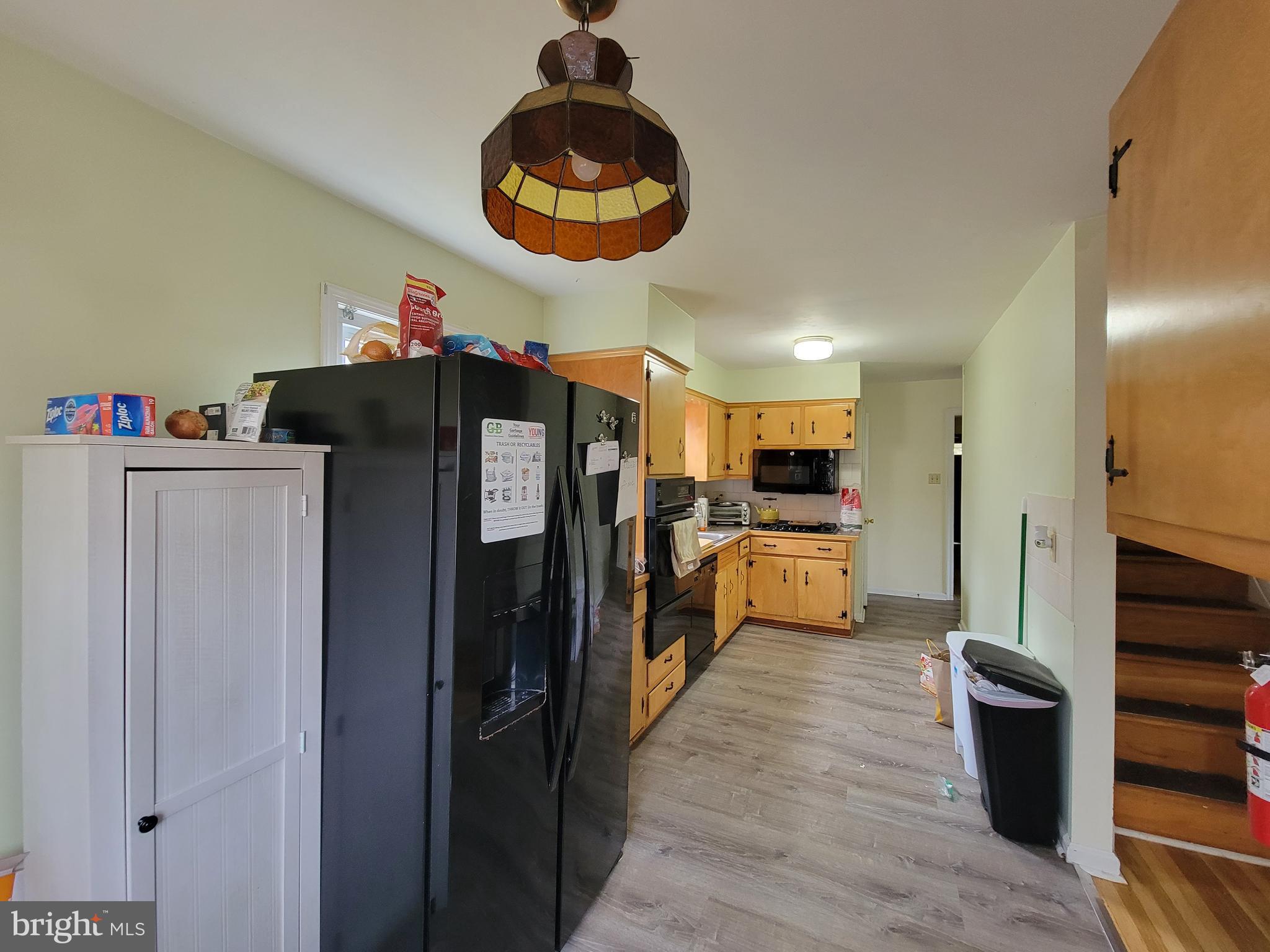212 Cornell Road Glassboro, NJ 08028 - Photo 7 of 19 a kitchen with stainless steel appliances kitchen island granite countertop a refrigerator and a stove top oven