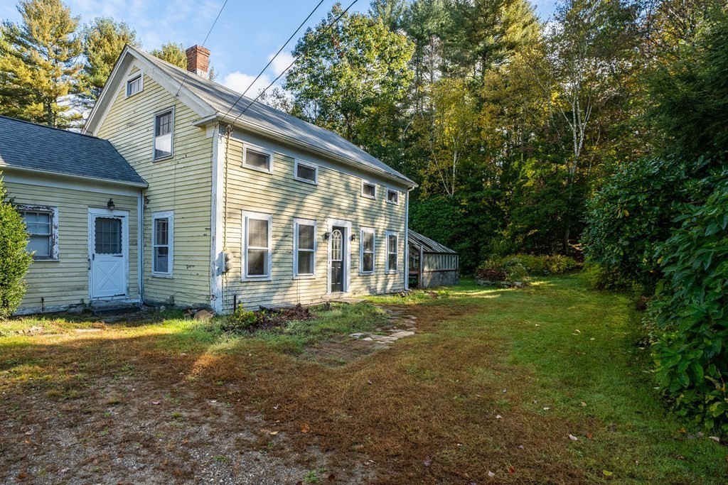 76 Amherst Road Pelham, MA 01002 - Photo 2 of 42 a view of a house with a yard