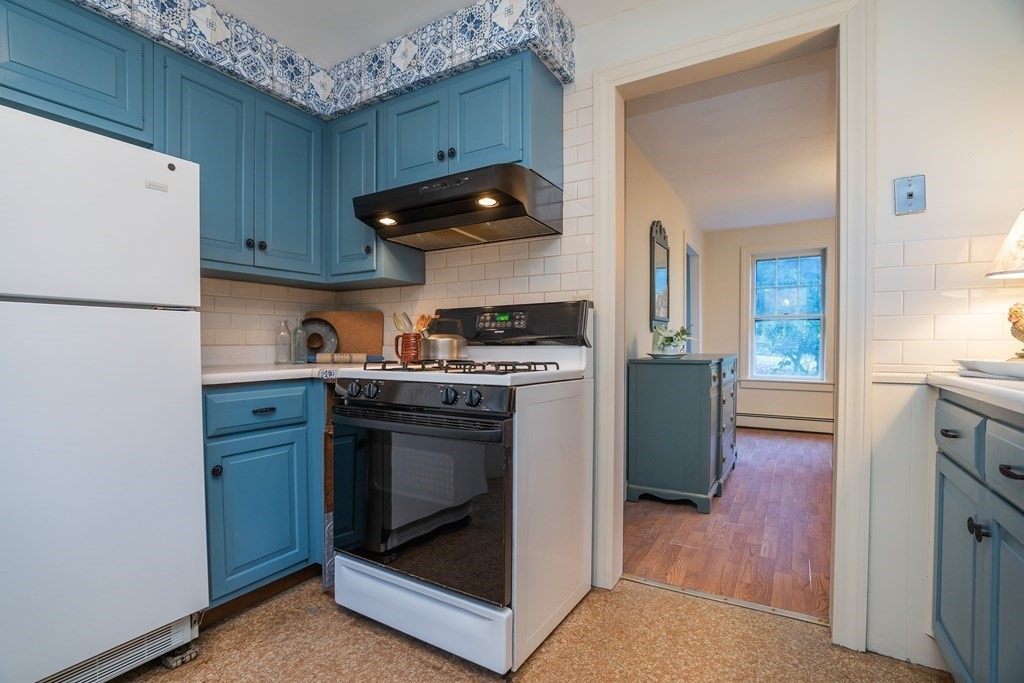 76 Amherst Road Pelham, MA 01002 - Photo 29 of 42 a kitchen with stainless steel appliances granite countertop a refrigerator stove and sink