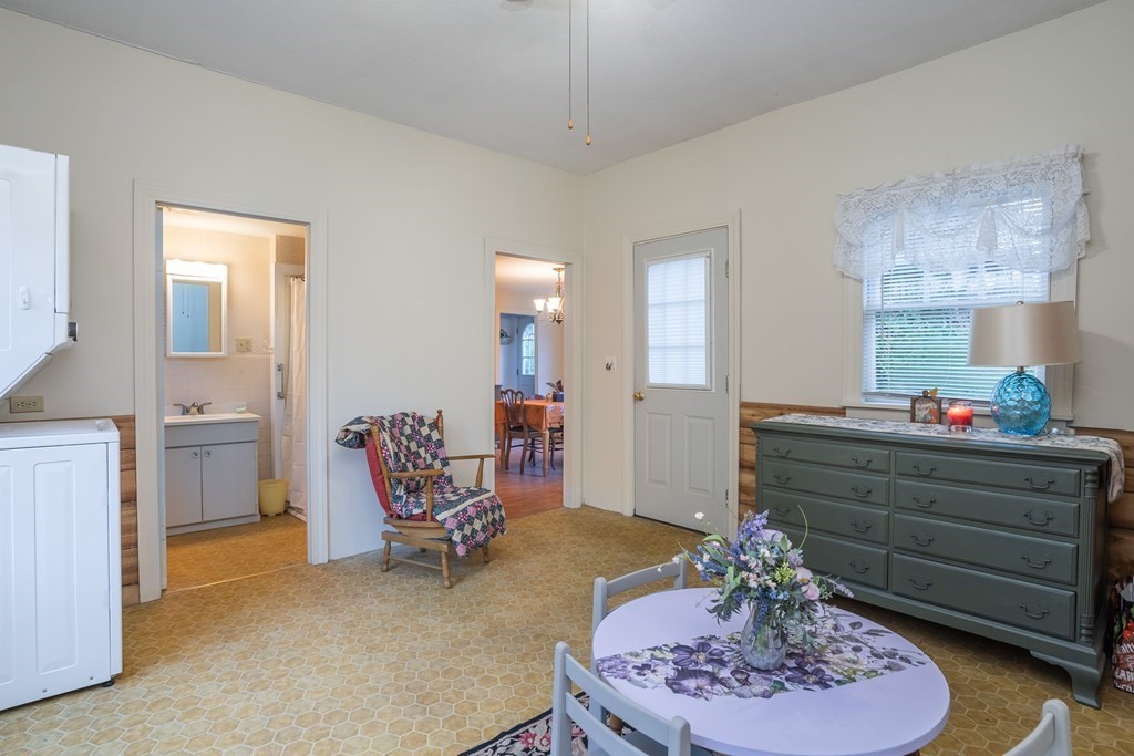 76 Amherst Road Pelham, MA 01002 - Photo 33 of 42 a living room with furniture and a mirror