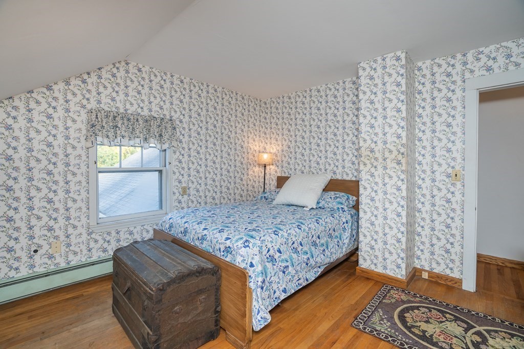 76 Amherst Road Pelham, MA 01002 - Photo 35 of 42 a bedroom with bed and window