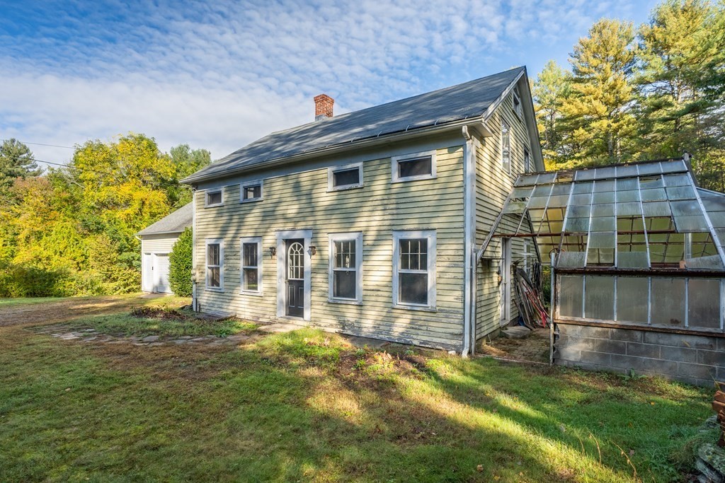 76 Amherst Road Pelham, MA 01002 - Photo 4 of 42 a view of a house with a yard
