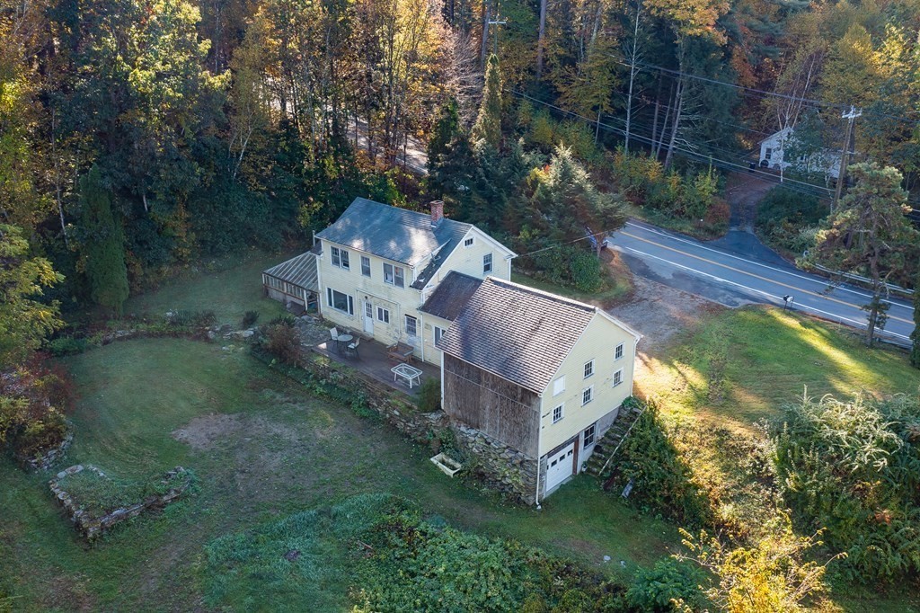 76 Amherst Road Pelham, MA 01002 - Photo 7 of 42 an aerial view of a house with a yard