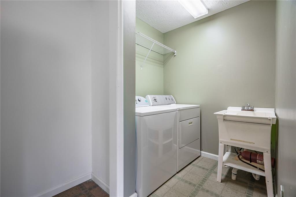 450 High Ridge Lane Dahlonega, GA 30533 - Photo 13 of 39 a utility room with dryer and washer