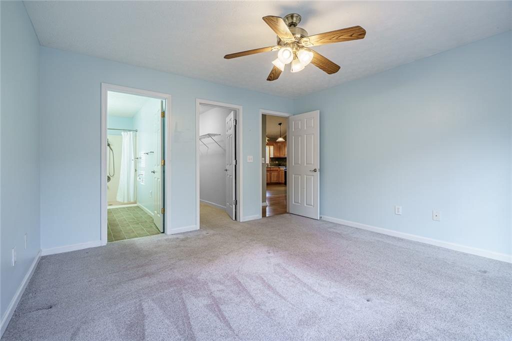 450 High Ridge Lane Dahlonega, GA 30533 - Photo 14 of 39 a view of a big room with closet and a ceiling fan