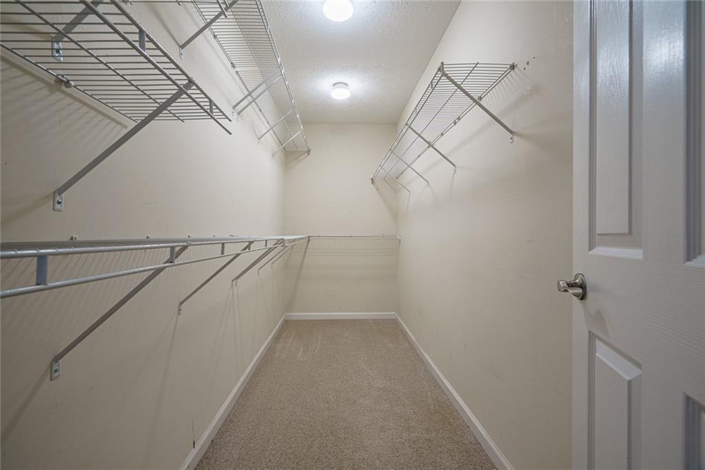 450 High Ridge Lane Dahlonega, GA 30533 - Photo 16 of 39 a view of a room with racks on the wall
