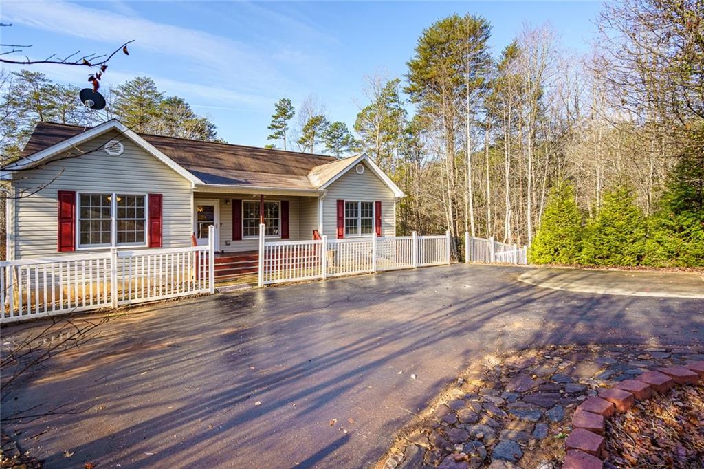 450 High Ridge Lane Dahlonega, GA 30533 - Photo 2 of 39 a view of a house with a wooden deck