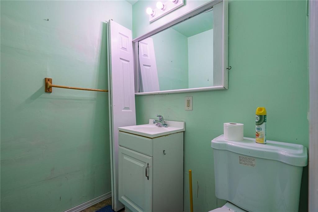 450 High Ridge Lane Dahlonega, GA 30533 - Photo 29 of 39 a bathroom with a sink and a mirror