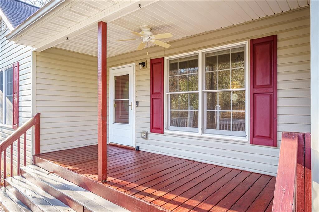 450 High Ridge Lane Dahlonega, GA 30533 - Photo 3 of 39 a view of a house with porch and wooden floor